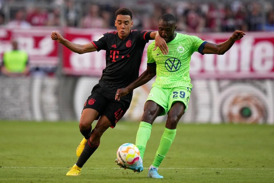 Bayern’s Jamal Musiala (left) impressed in his side comfortable victory over Wolfsburg (AP Photo/Matthias Schrader) (AP)