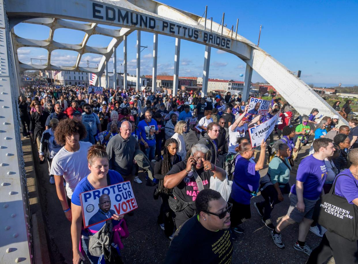 Marchers cross the Edmund Pettus Bridge in Selma, Ala., on March 3 during the 59th anniversary celebration of the Bloody Sunday March. The assault on civil rights protestors there in 1965 marked a turning point in the nation's civil rights movement.