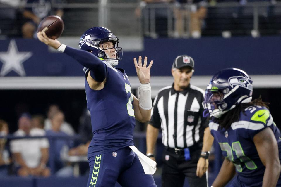 Seattle Seahawks quarterback Drew Lock (2) throws a pass in the first half of a preseason NFL football game against the Dallas Cowboys in Arlington, Texas, Friday, Aug. 26, 2022. (AP Photo/Michael Ainsworth)