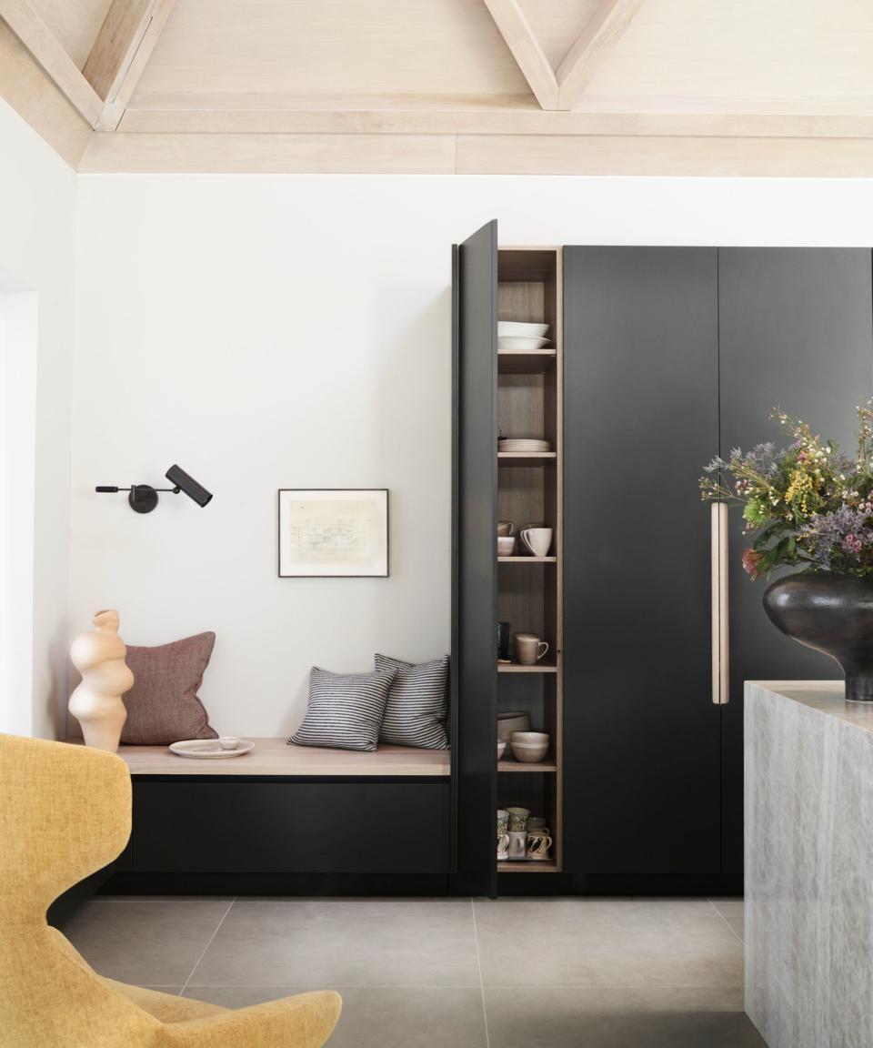 Black cabinet, wooden insides, wooden ceiling