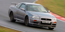 <p>The R34-generation Nissan Skyline GT-R is the holy grail of JDM desire, a dream car for those that grew up in the era where import cars where all the rage. But since the R34 didn't start production until 1999, there are still a few more years left to wait—unless you count the handful that were legally imported by Motorex when new, of course. </p>
