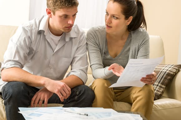 Young couple reviewing finances.