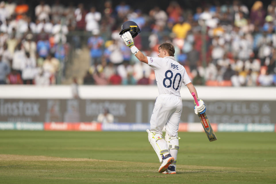 England's Ollie Pope celebrates his hundred runs on the third day of the first cricket test match between England and India in Hyderabad, India, Saturday, Jan. 27, 2024. (AP Photo/Mahesh Kumar A.)