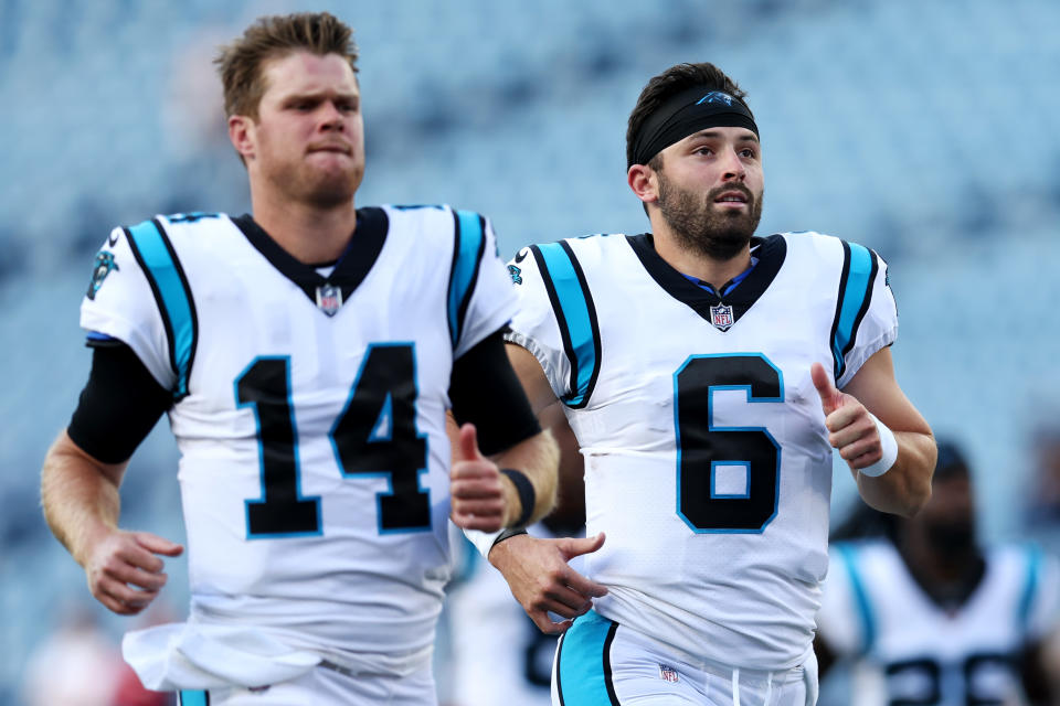 FOXBOROUGH, MASSACHUSETTS - AUGUST 19: Sam Darnold #14 of the Carolina Panthers and Baker Mayfield #6 warm up before the preseason game between the New England Patriots and the Carolina Panthers at Gillette Stadium on August 19, 2022 in Foxborough, Massachusetts. (Photo by Maddie Meyer/Getty Images)