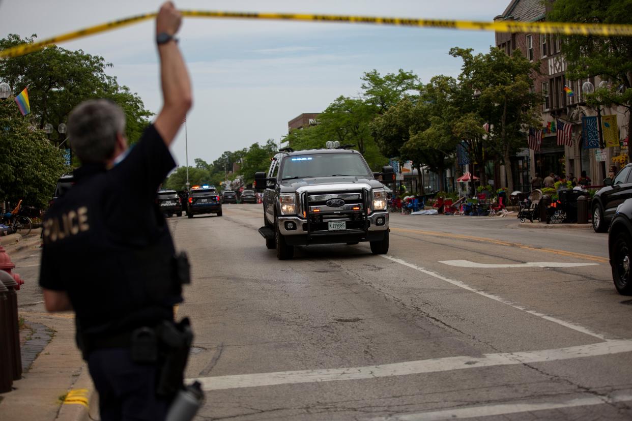 First responders work the scene of a shooting at a Fourth of July parade on July 4, 2022 in Highland Park, Illinois. 