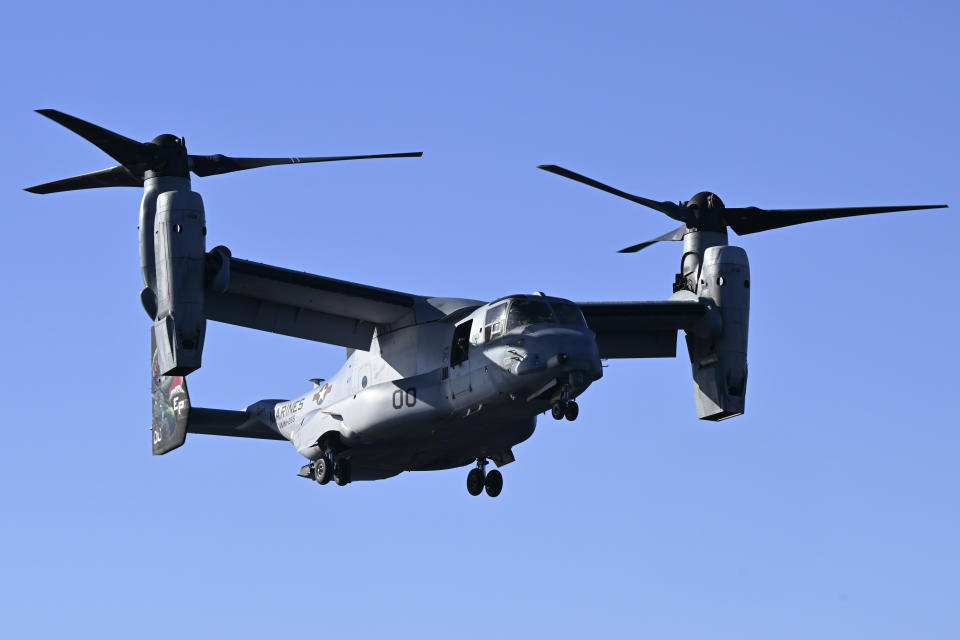 A MV-22B Osprey is seen coming in to land on the USS America off the coast of Brisbane, Tuesday, June 20, 2023. The Australian Defense Department said a Bell Boeing V-22 Osprey tiltrotor aircraft crashed on Melville Island, Sunday, Aug. 27, 2023 during Exercise Predators Run, which involves the militaries of the United States, Australia, Indonesia, the Philippines and East Timor. (Darren England/AAP Image via AP)