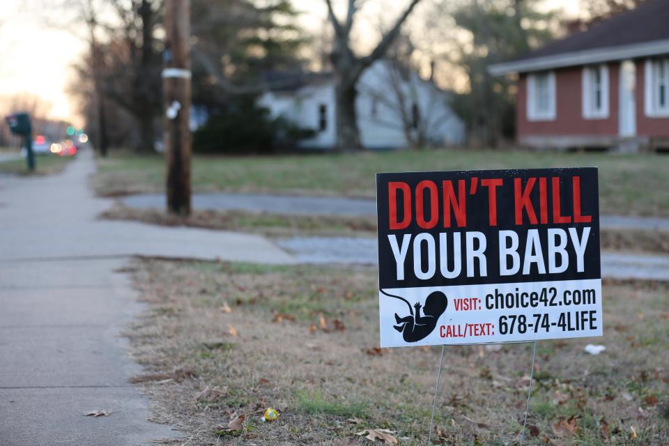 An anti-abortion sign in a yard in Carbondale, Illinois. December 2022.