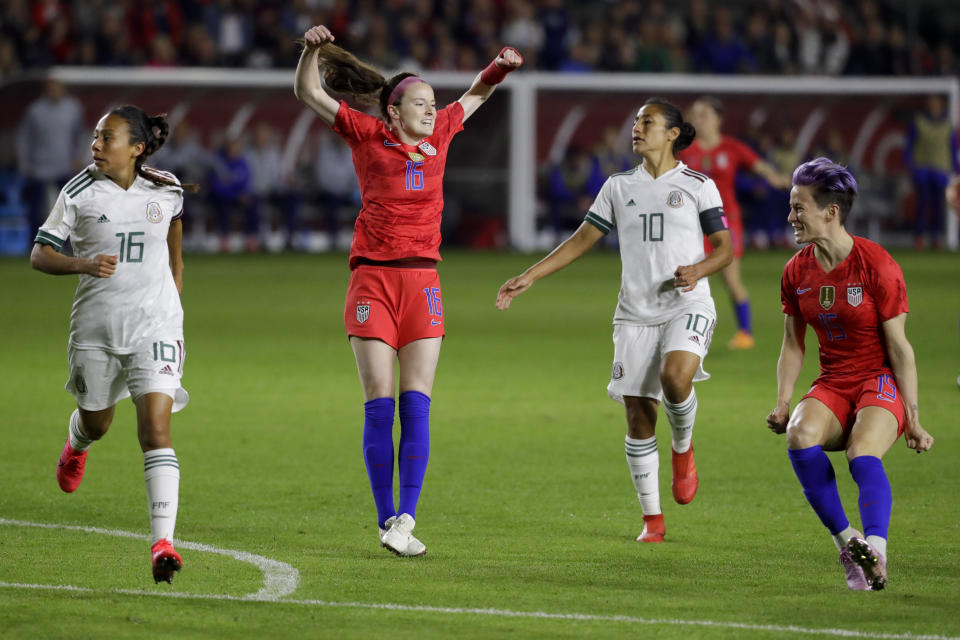 U.S. midfielder Rose Lavelle (16) celebrates after scoring against Mexico during the first half of a CONCACAF women's Olympic qualifying soccer match Friday, Feb. 7, 2020, in Carson, Calif. (AP Photo/Chris Carlson)