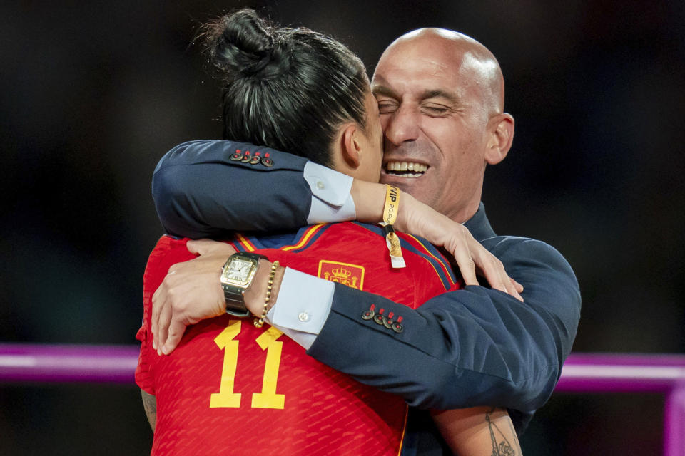 Luis Rubiales, president of the Spanish soccer federation, hugs Spanish soccer star Jenni Hermoso after the Women's World Cup Final in Sydney on Aug. 20, 2023. (Noe Llamas / Sipa USA via AP)