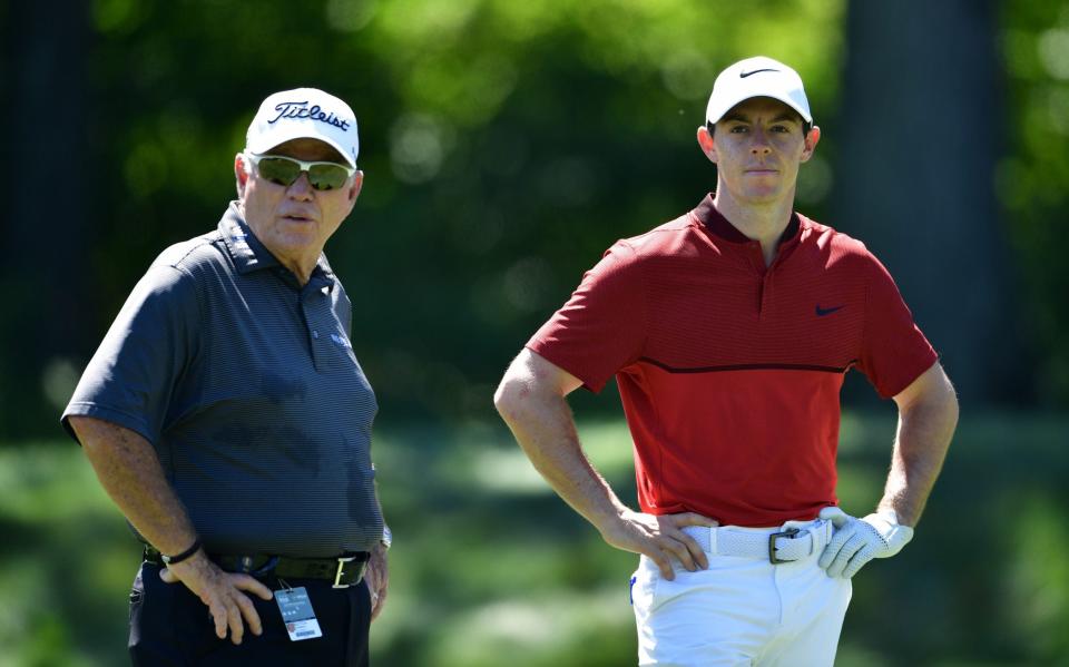 Roty McIlroy and Butch Harmon