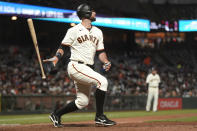 San Francisco Giants' Brandon Belt watches his home run against the San Diego Padres during the seventh inning of a baseball game in San Francisco, Wednesday, Sept. 15, 2021. (AP Photo/Jeff Chiu)