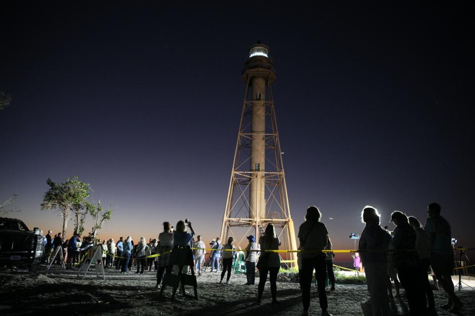 A relighting ceremony of the Sanibel Lighthouse was held on Tuesday, Feb. 28, 2023 morning. Members of the community showed up for the 6 a.m. event. The light was turned on a few minutes after six. The lighthouse has been dark since Hurricane Ian slammed into Southwest Florida. One of the legs was washed away and the cottages were destroyed in the storm. The leg is being repaired.  