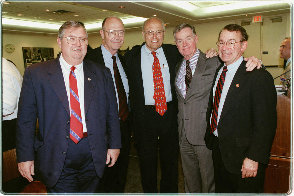 Rep. Charles Norwood (R-Ga.); Dr. Thomas Reardon, president of the American Medical Association; Dingell; Dr. E. Radcliffe Anderson, CEO of the AMA; and Rep. Greg Ganske (R-Iowa) pose after final passage of the managed care bill in 1999.