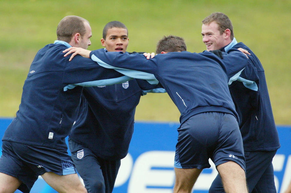 MANCHESTER - NOVEMBER 14: Danny Murphy, Jermaine Jenas, John Terry and Wayne Rooney stretch during England training at the Cliff training ground, Manchester prior to the international friendly against Denmark on November 13, 2003. (Photo Gary M Prior/ Getty Images)