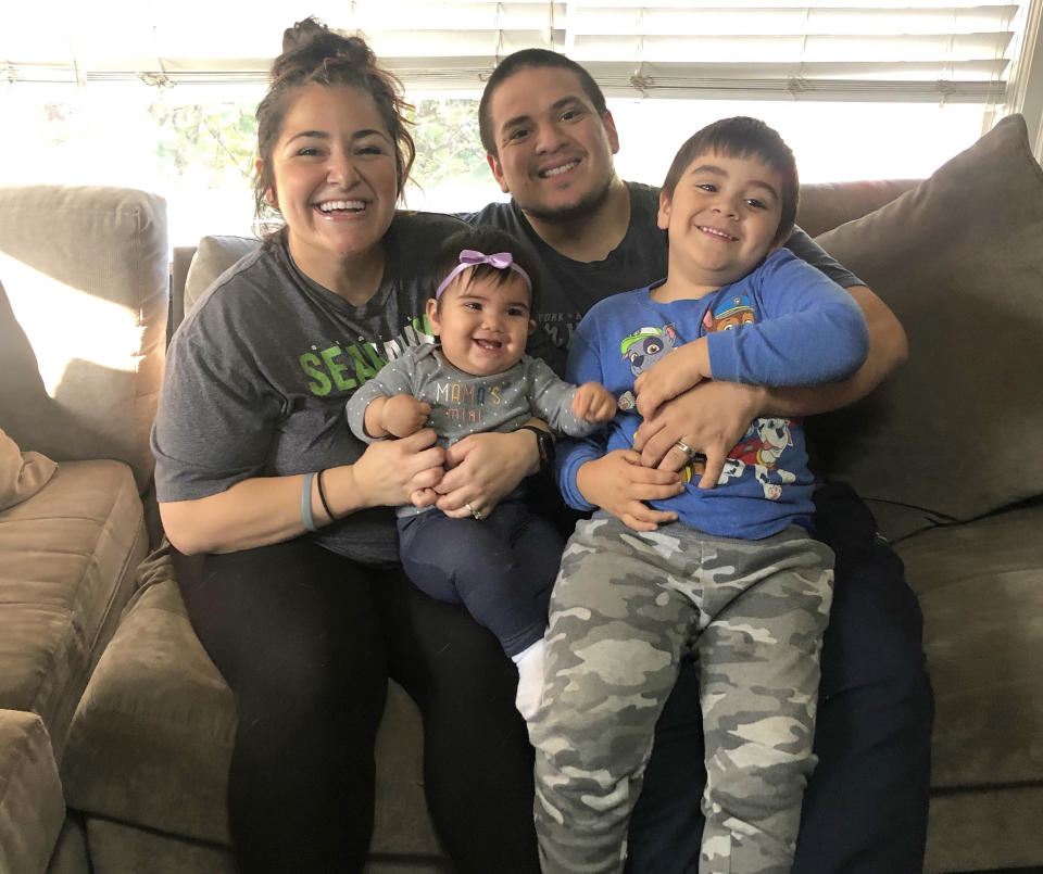 Vanessa Romero, pictured here with her family, left her job at Seattle-Tacoma International Airport in order to keep her kids and her aging mom safe from the coronavirus. (Rosario Ricardo )