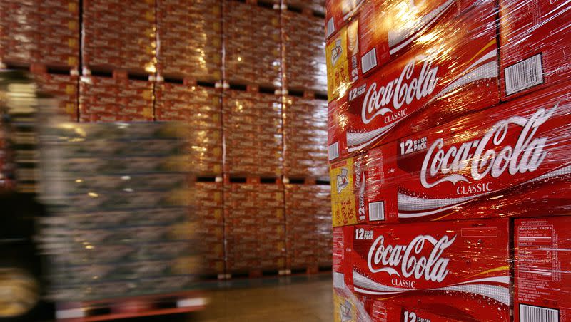 A palette of Sprite is transported past walls of Coca-Cola Classic at the Swire Coca-Cola distribution facility Thursday, July 21, 2005, in Sandy, Utah. 