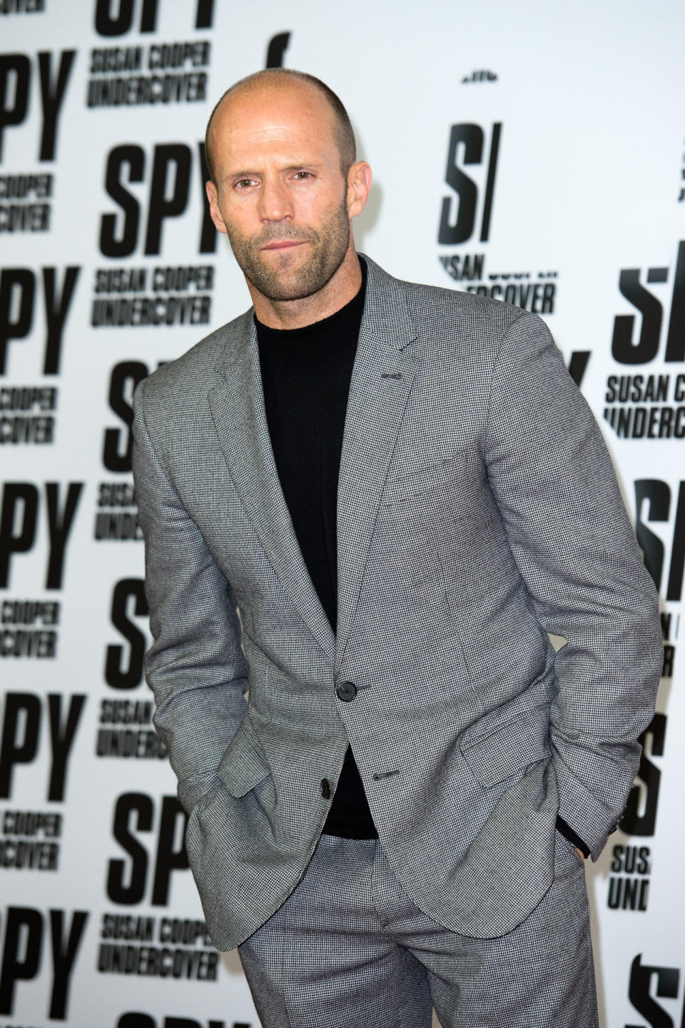 Jason Statham loves a gray suit so much he wore one thrice. He mixed up his uniform with a black T-shirt as opposed to a button-down underneath.