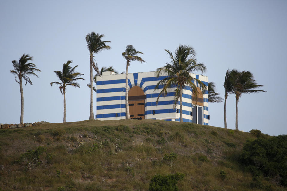 A building stands on top of a hill on Little St. James Island, owned by fund manager Jeffrey Epstein, in St. Thomas, U.S. Virgin Islands, on Wednesday, July 10, 2019.  / Credit: Marco Bello/Bloomberg via Getty Images