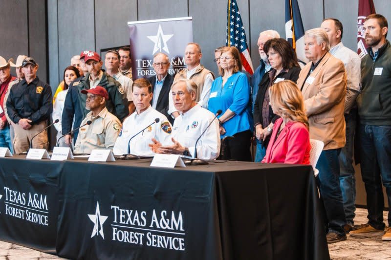 Texas Gov. Gregg Abbott (C) and state officials working to contain the Panhandle wildfires held a press conference in Austin Friday to update the situation was the weekend weather forecast called for dangerous conditions. Photo courtesy Texas Governor's Office/Facebook