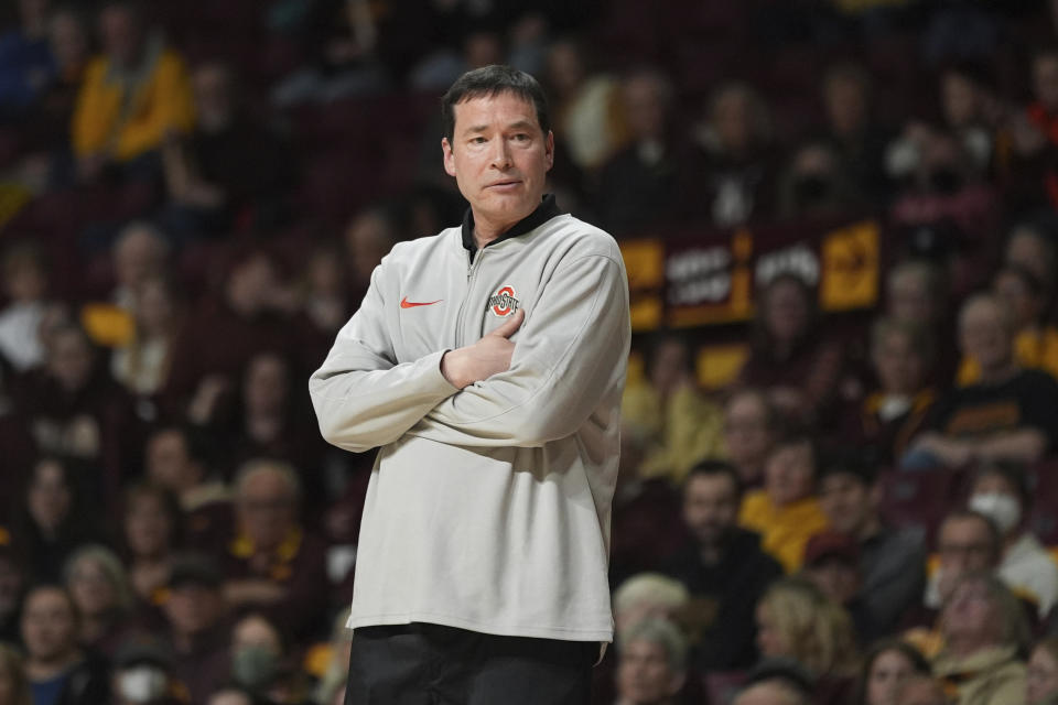 Ohio State head coach Kevin McGuff watches play during the first half of the team's NCAA college basketball game against Minnesota, Thursday, Feb. 8, 2024, in Minneapolis. (AP Photo/Abbie Parr)