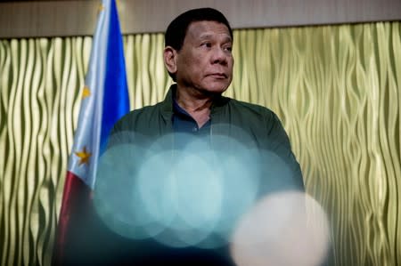 FILE PHOTO: Philippines President Rodrigo Duterte arrives to greet the U.S. Secretary of State Mike Pompeo at Colonel Jesus Villamor Air Base in Manila