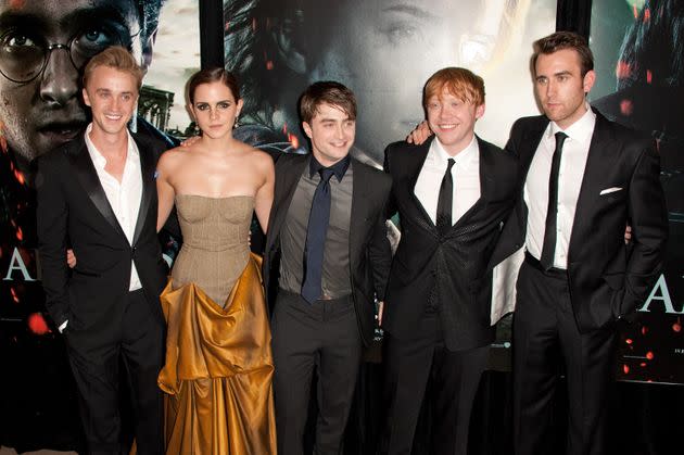 From left: Felton, Watson, Daniel Radcliffe, Rupert Grint, and Matthew Lewis attend the premiere of 