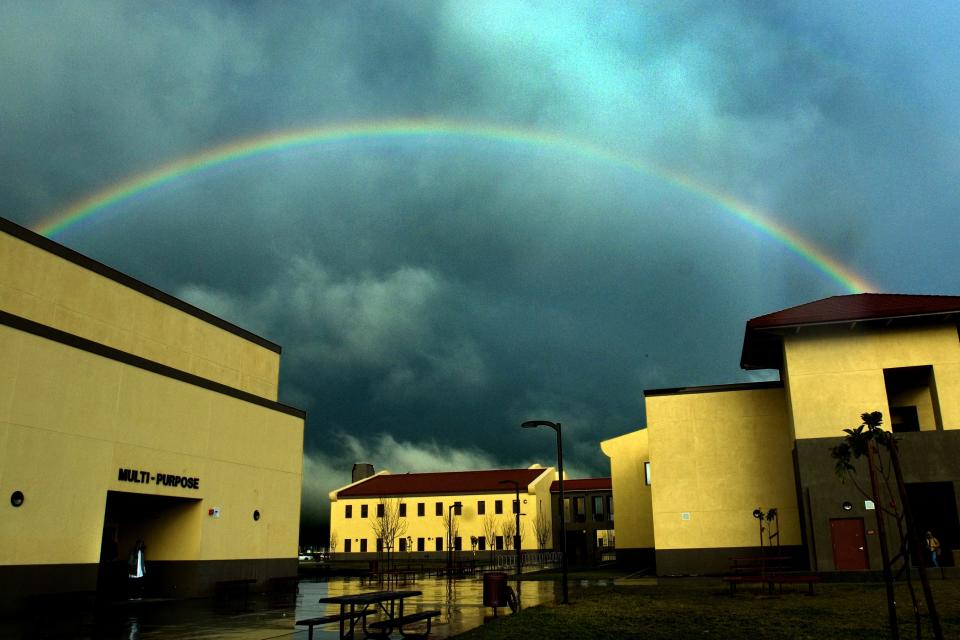 A rainbow appears over Chavez High School during a break in a storm in Stockton on Jan. 22, 2008.