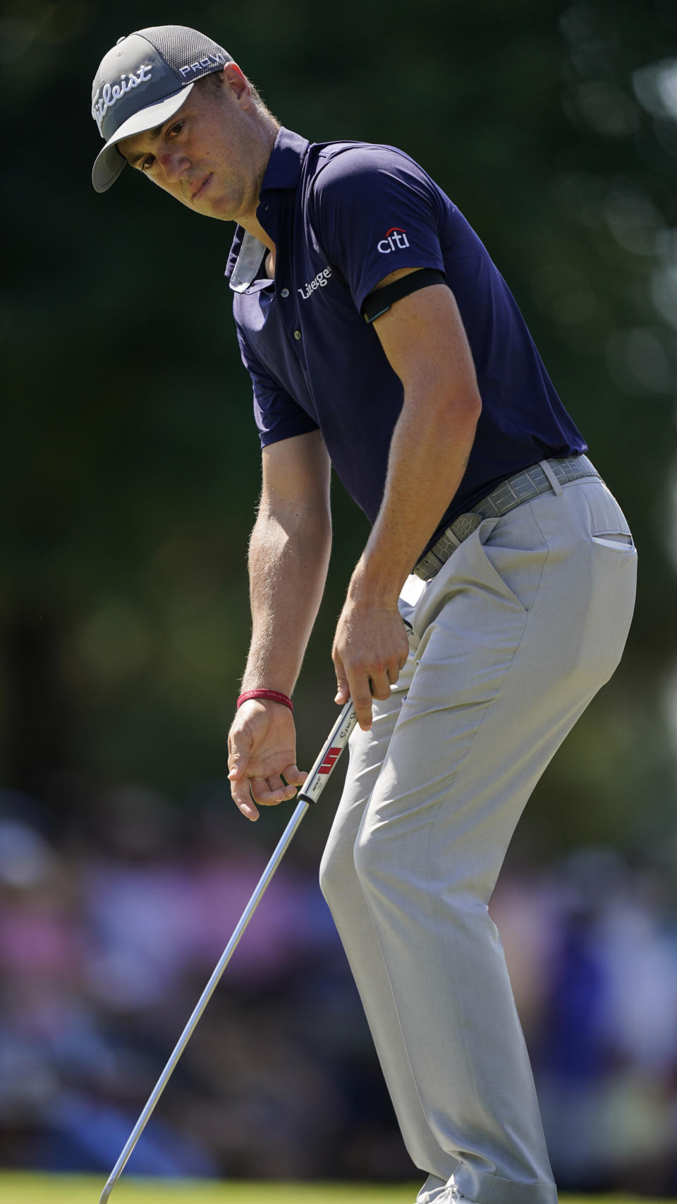 Justin Thomas reacts after his putt on the first green during the third round of the Tour Championship golf tournament Saturday, Sept. 4, 2021, at East Lake Golf Club in Atlanta. (AP Photo/Brynn Anderson)