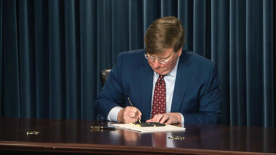 Republican Mississippi Gov. Tate Reeves signs House Bill 1125, Regulate Experimental Adolescent Procedures (REAP) Act. (WLBT)