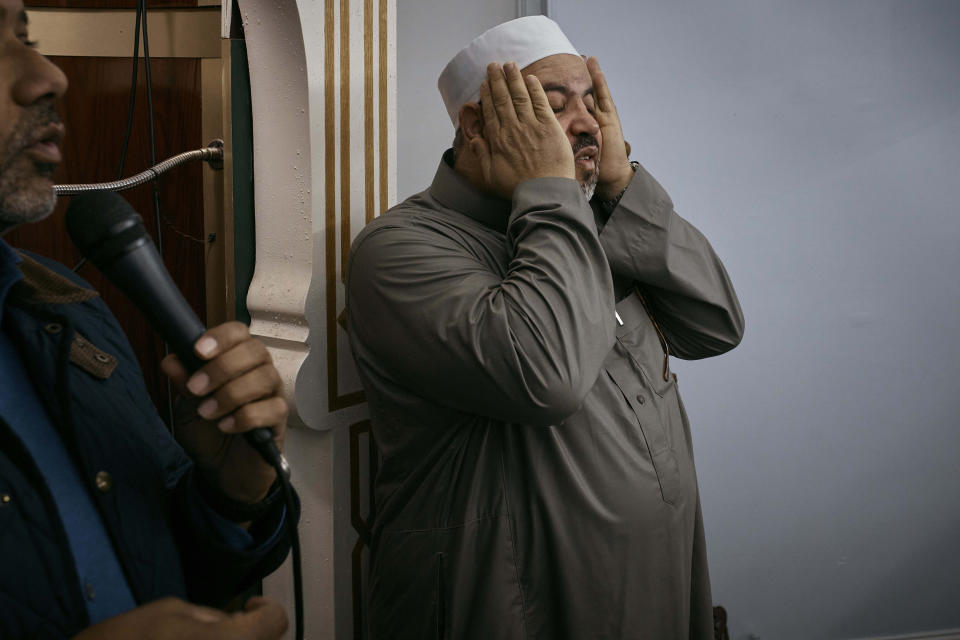 Imam Mohamed Isbr reacts during a prayer at the Islamic Society of Bay Ridge mosque on Friday, Oct. 13, 2023, in the Brooklyn borough of New York. In Muslim communities across the world, worshippers gathered at mosques for their first Friday prayers since Hamas militants attacked Israel, igniting the latest Israel-Palestinian war. (AP Photo/Andres Kudacki)