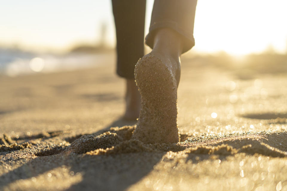 bare feet in the sand