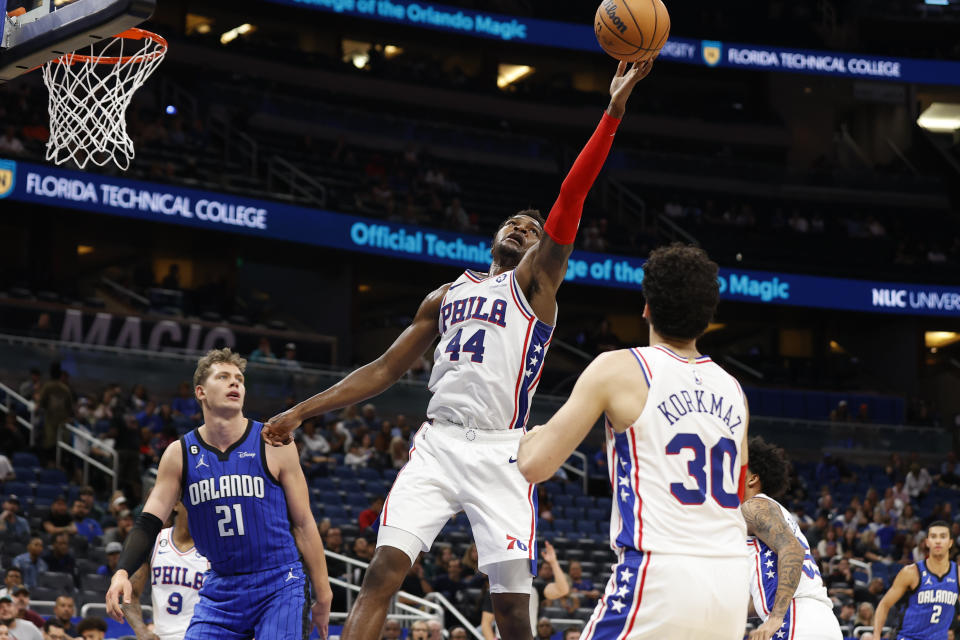 Philadelphia 76ers forward Paul Reed (44) reaches for a rebound against the Orlando Magic during the second half of an NBA basketball game Sunday, Nov. 27, 2022, in Orlando, Fla. (AP Photo/Scott Audette)