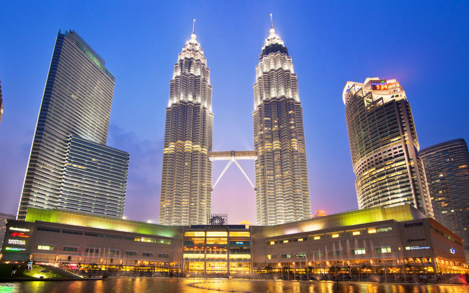 <p>The tallest set of twin towers in the world was actually the pair of the tallest buildings period from 1998 until 2004. The majestic skyscrapers ooze a distinctly Malaysian design and are connected by a two-story skybridge a full 558 feet above the ground. The towers provide office space and feature a large shopping mall below them.</p>