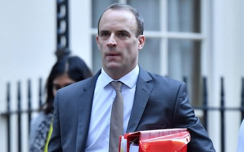 Dominic Raab leaves Downing Street before his resignation as Brexit Secretary  - Credit: BEN STANSALL/AFP