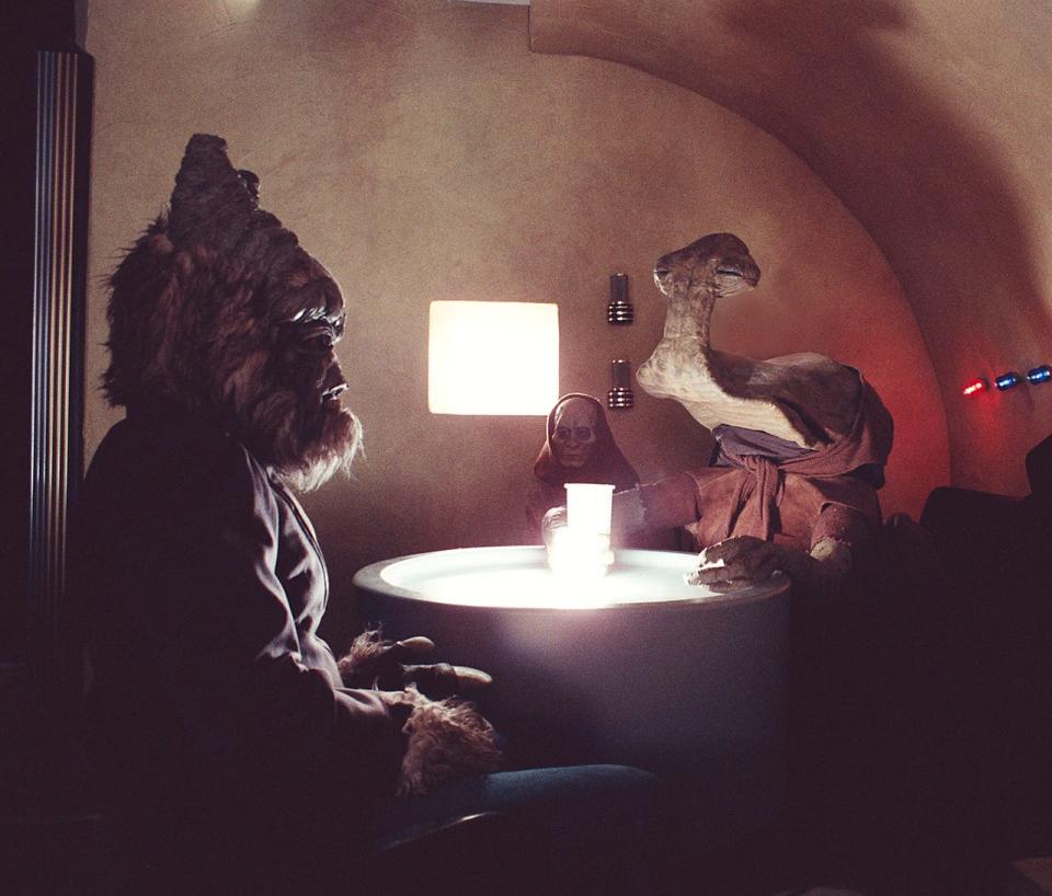 Because George Lucas wanted a more crowded Mos Eisley Cantina, ILM added extra aliens in reshoots of the iconic "Star Wars" scene.