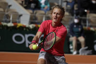 Sebastian Korda of the U.S. plays a shot against Spain's Rafael Nadal in the fourth round match of the French Open tennis tournament at the Roland Garros stadium in Paris, France, Sunday, Oct. 4, 2020. (AP Photo/Alessandra Tarantino)