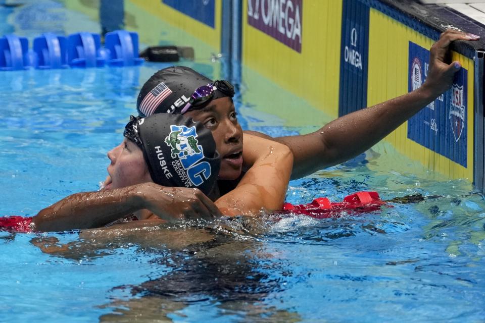 Torri Huske hugs Simone Manuel after the Women's 50 freestyle finals Sunday, June 23, 2024, at the US Swimming Olympic Trials in Indianapolis. (AP Photo/Darron Cummings)