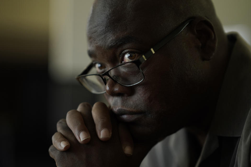 Terrence Hersey sits for a portrait at his home Friday, June 17, 2022, in South Holland, Ill. Hersey underwent extensive rehabilitation for a stroke in 2015, before his doctors eventually cleared him to return to work in 2016. But Union Pacific decided without ever having a doctor examine him that the stroke made him unfit to work for the railroad. Union Pacific has already lost three lawsuits over the way it dismisses employees with health conditions because of safety concerns, and the prospect of hundreds more similar lawsuits, including Hersey's case, looms over the railroad. (AP Photo/Charles Rex Arbogast)