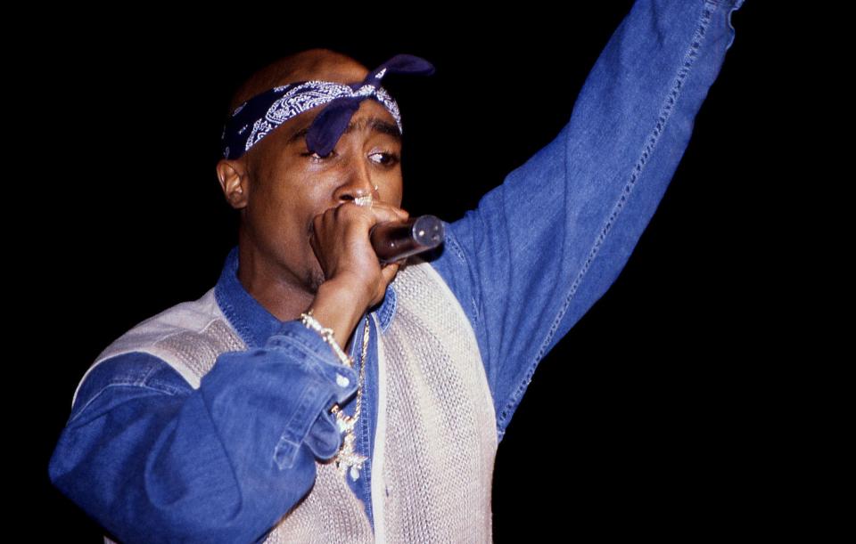 Rapper Tupac Shakur (Lesane Parish Crooks, name later changed to Tupac Amaru Shakur) performs at the Regal Theater in Chicago, Illinois in March 1994.