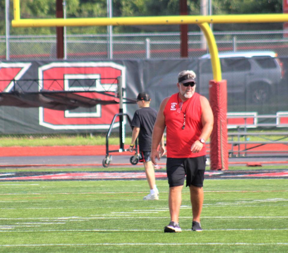 Lakota West head football coach Tom Bolden watches his players. Lakota West High School football practice, August 2, 2023.