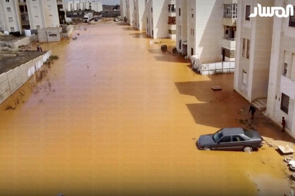 CORRECTS THE NAME OF THE STORM TO DANIEL - Streets a flooded after storm Daniel in Marj, Libya, Monday, Sept. 11, 2023. The head of one of Libya’s rival governments says that 2,000 people are feared dead in flooding that swept through the eastern parts of the north African nation. (Libya Almasar TV via AP)