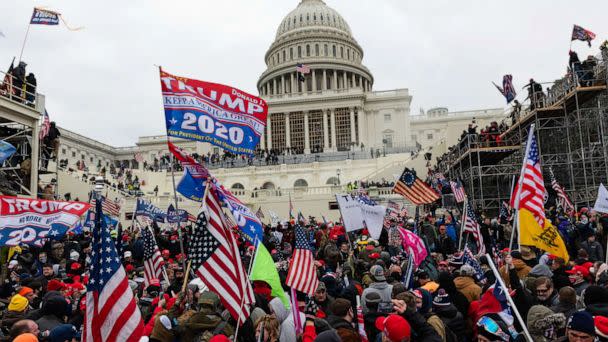 PHOTO: Demonstrators attempt to enter the U.S. Capitol building during a protest in Washington, D.C., Jan. 6, 2021. (Eric Lee/Bloomberg via Getty Images, FILE)