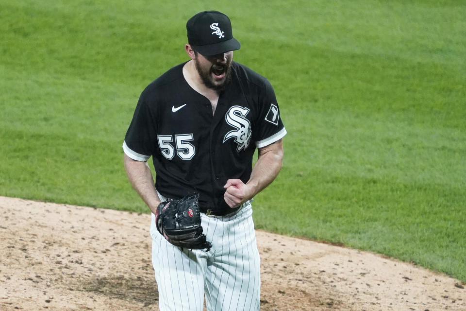 Chicago White Sox starting pitcher Carlos Rodon (55) pumps his fist after striking out Cleveland Indians' Yu Chang (2) to end the sixth inning of a baseball game, Wednesday, April, 14, 2021, in Chicago. (AP Photo/David Banks)