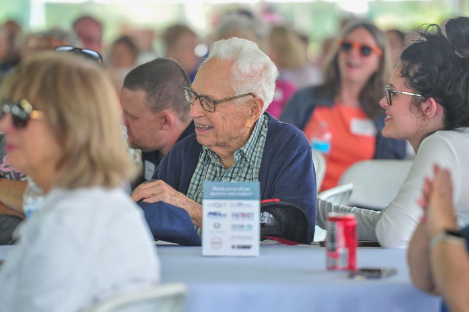 Jim Young, who started working at K-25 on May 8, 1944, smiles during the first K-25 reunion on Saturday, April 27 in Oak Ridge, Tenn. He's now 101.