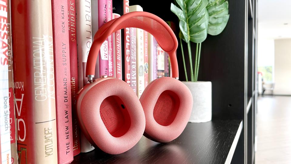 The Apple AirPods Max displayed on a bookshelf