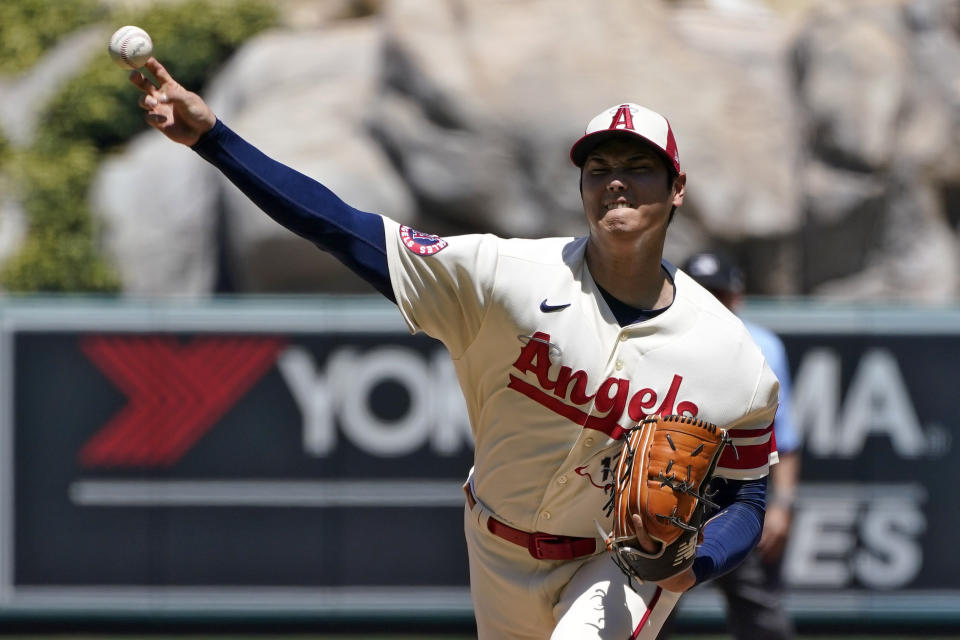 Los Angeles Angels starting pitcher Shohei Ohtani throws to the plate during the second inning in the first baseball game of a doubleheader Wednesday, Aug. 23, 2023, in Anaheim, Calif. (AP Photo/Mark J. Terrill)