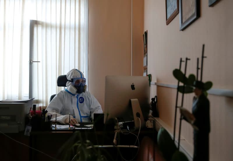 FILE PHOTO: Medical workers take care of the coronavirus disease (COVID-19) patients at a hospital in Moscow