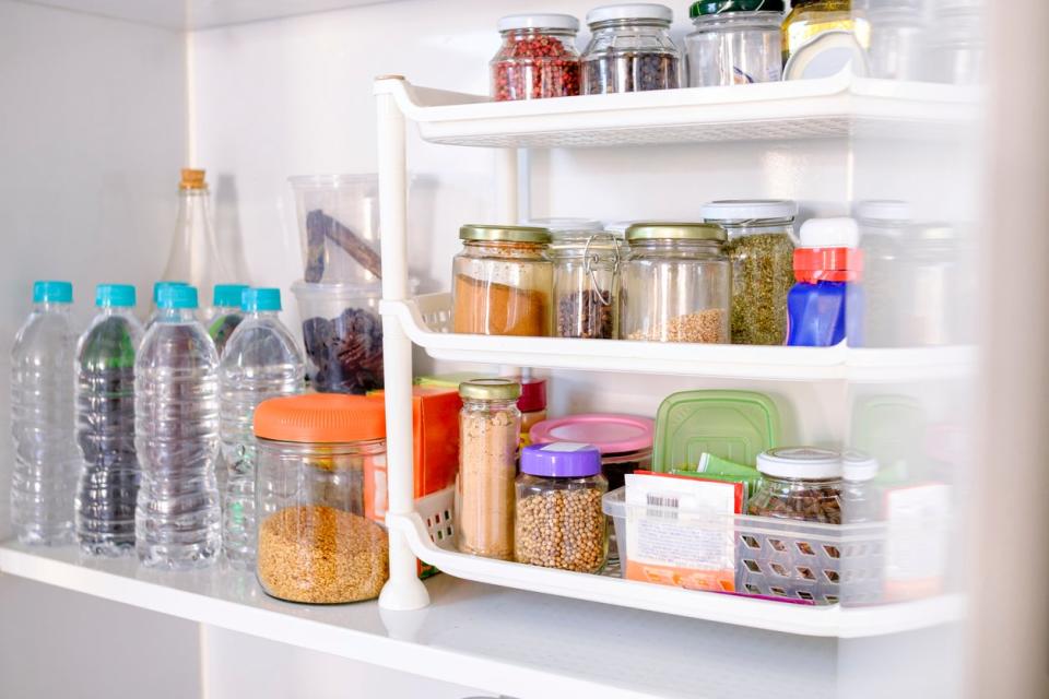 Pantry well stocked with various products.