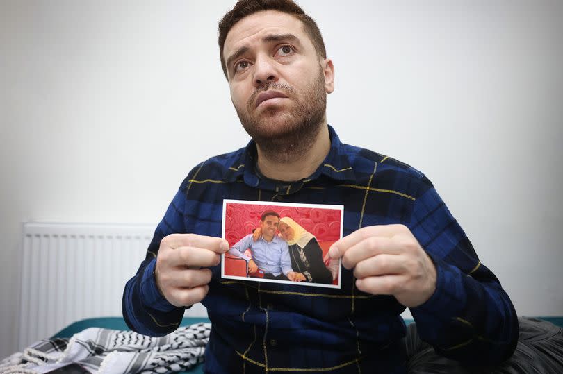 Dalloul with an image of his late mother