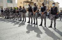 Jordanians demonstrate to express solidarity with the Palestinian people, near the Israeli embassy in Amman